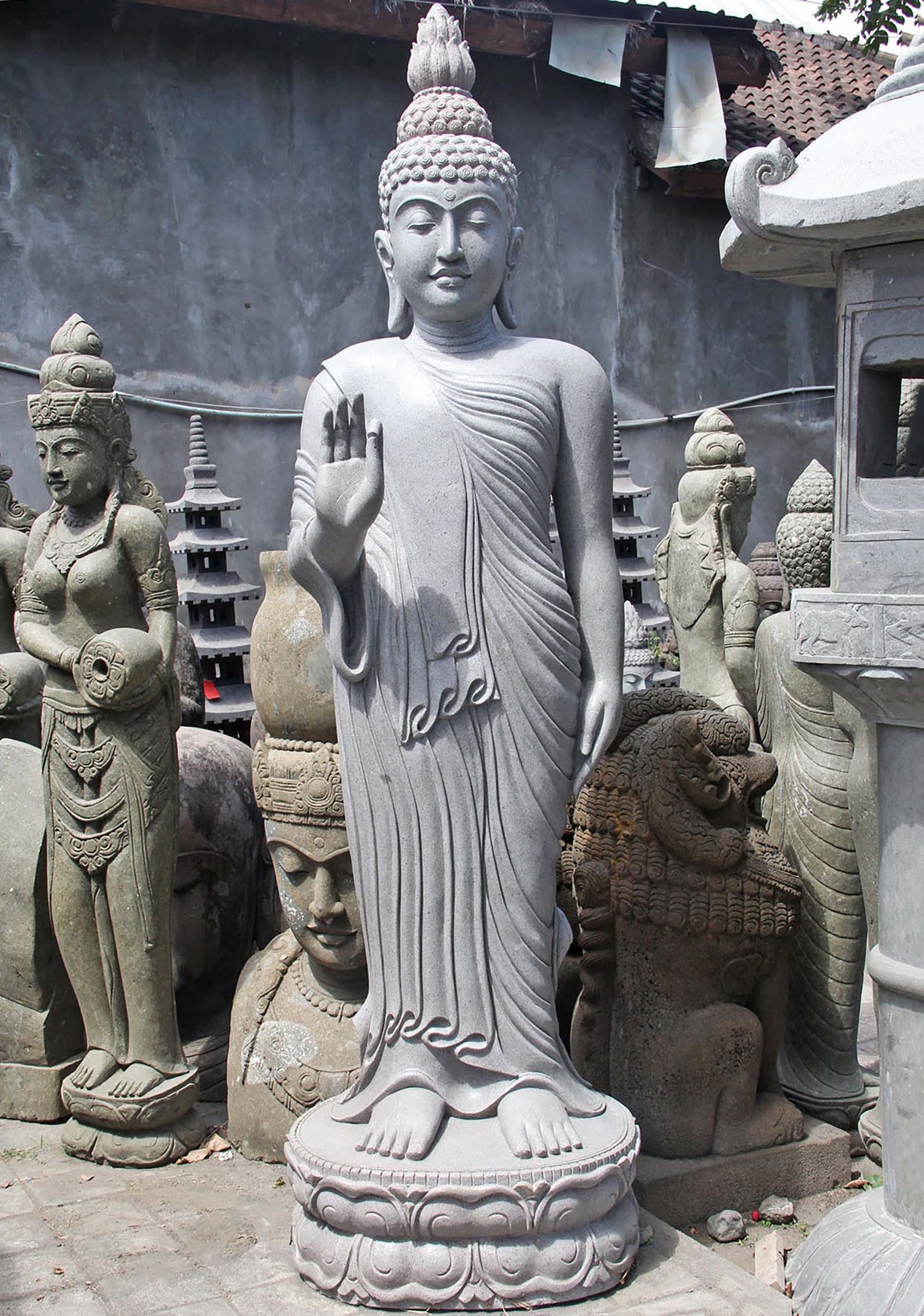 Standing Buddha statue symbolizing readiness and teaching